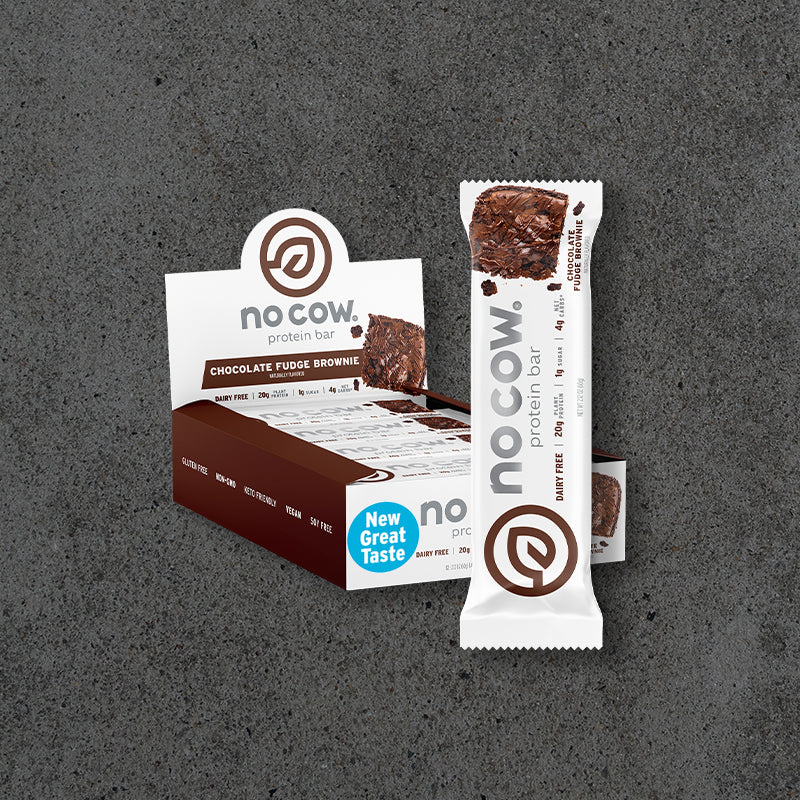No Cow protein bar packaging on a gray background
