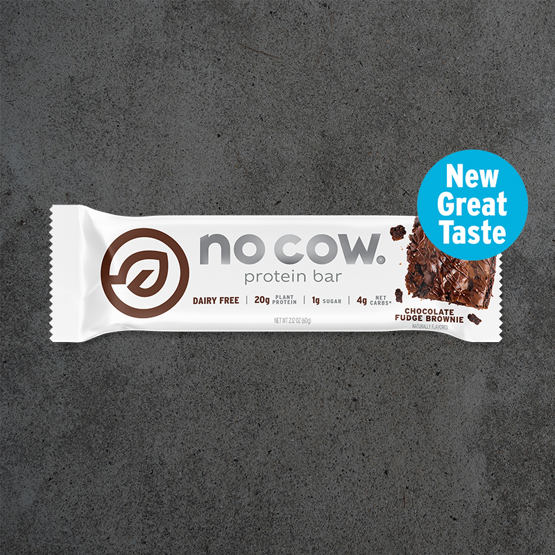 No Cow protein bar packaging on a dark gray background