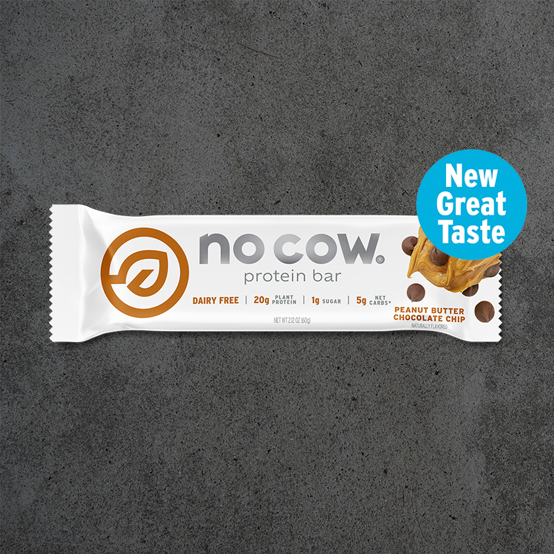 no cow peanut butter chocolate chip protein bar packaging on a dark gray background